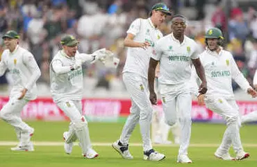 South Africa's Kagiso Rabada celebrates with teammates (AP Photo/Kirsty Wigglesworth)