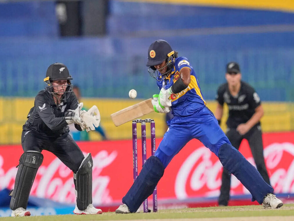 Nilakshi De Silva strikes a boundary as Sri Lanka Women post 258/6 vs New Zealand in rain-interrupted Women’s World Cup 2025 match.